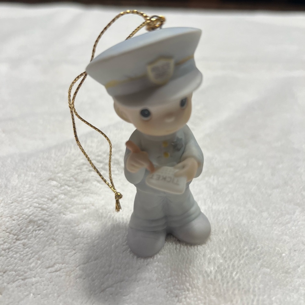 Precious Moments White and Gold police Ornament